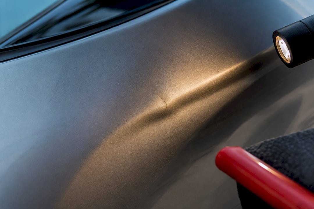 Same Day $75–$500 Fix: Quarter Panel PDR From a Technician 1 Paint Crack Across Quarter Panel Dent