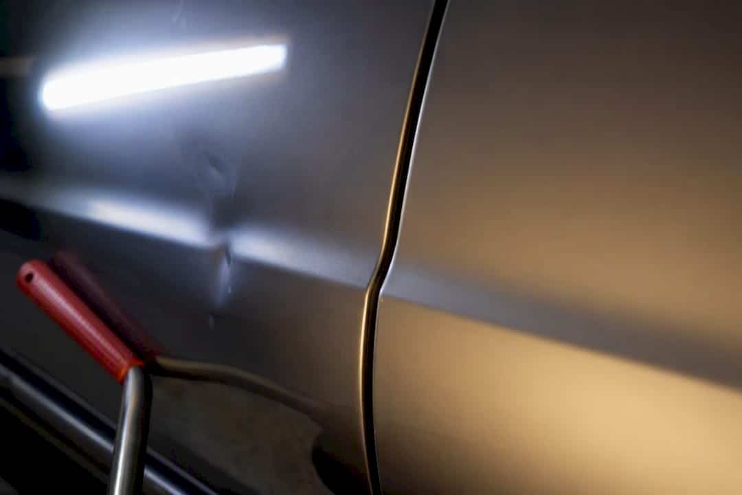Double-panel dent before-and-after repair detail
