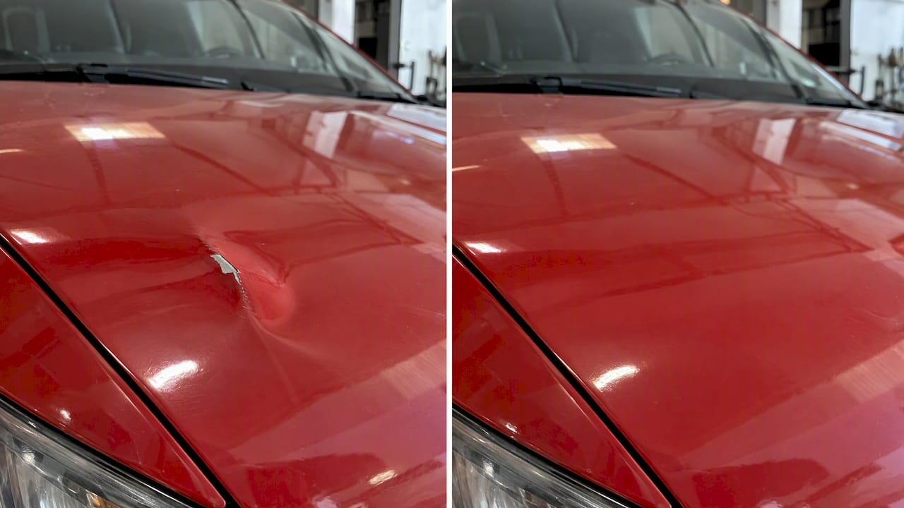 Dented panel with chipped paint beside its repair